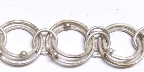Judy Larson's Making Chain with Wubbers and Wire - , Contemporary Wire Jewelry, Making Chain, Chain Making , Butane Torch, Soldering, Solder, Move the first ring out of the way before fusing or soldering the second ring.    